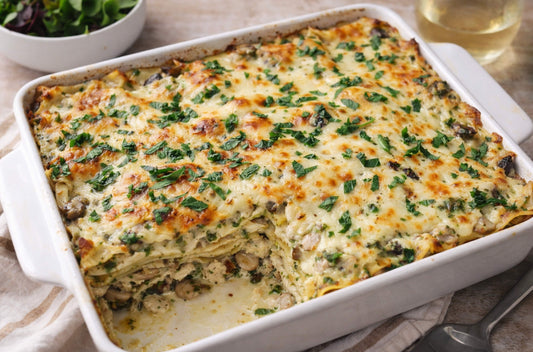 Halibut pesto lasagna layered with wild-caught Alaskan halibut, pesto, mushrooms, and bubbling pepper jack cheese.