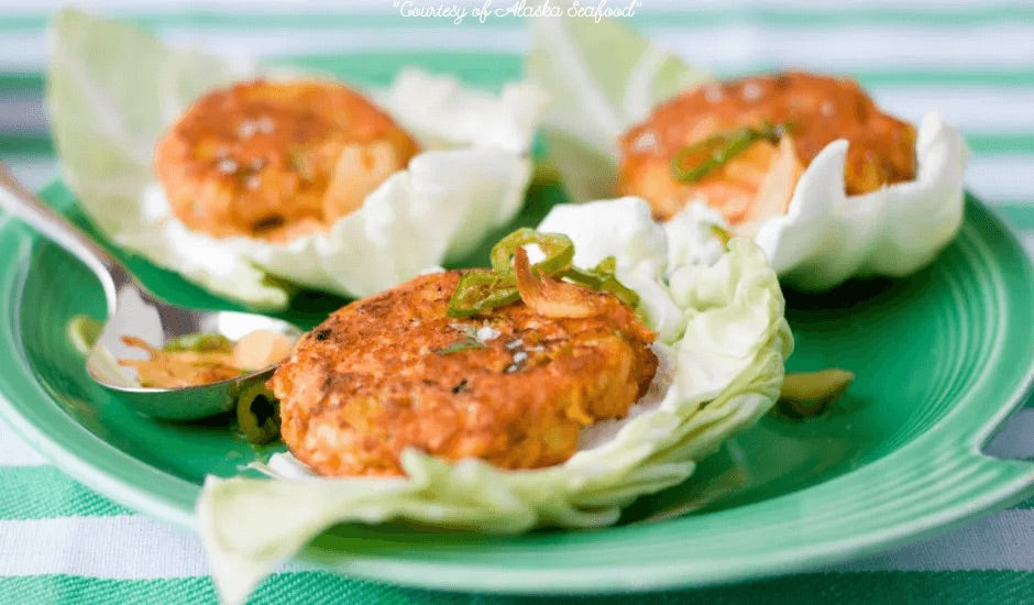 Golden salmon cakes made with wild Alaska sockeye, served on cabbage leaves, topped with crispy turmeric garlic and cucumber yogurt.