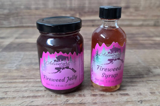 Wild Alaskan fireweed jelly and fireweed syrup from Adventure Harvest on a wooden background