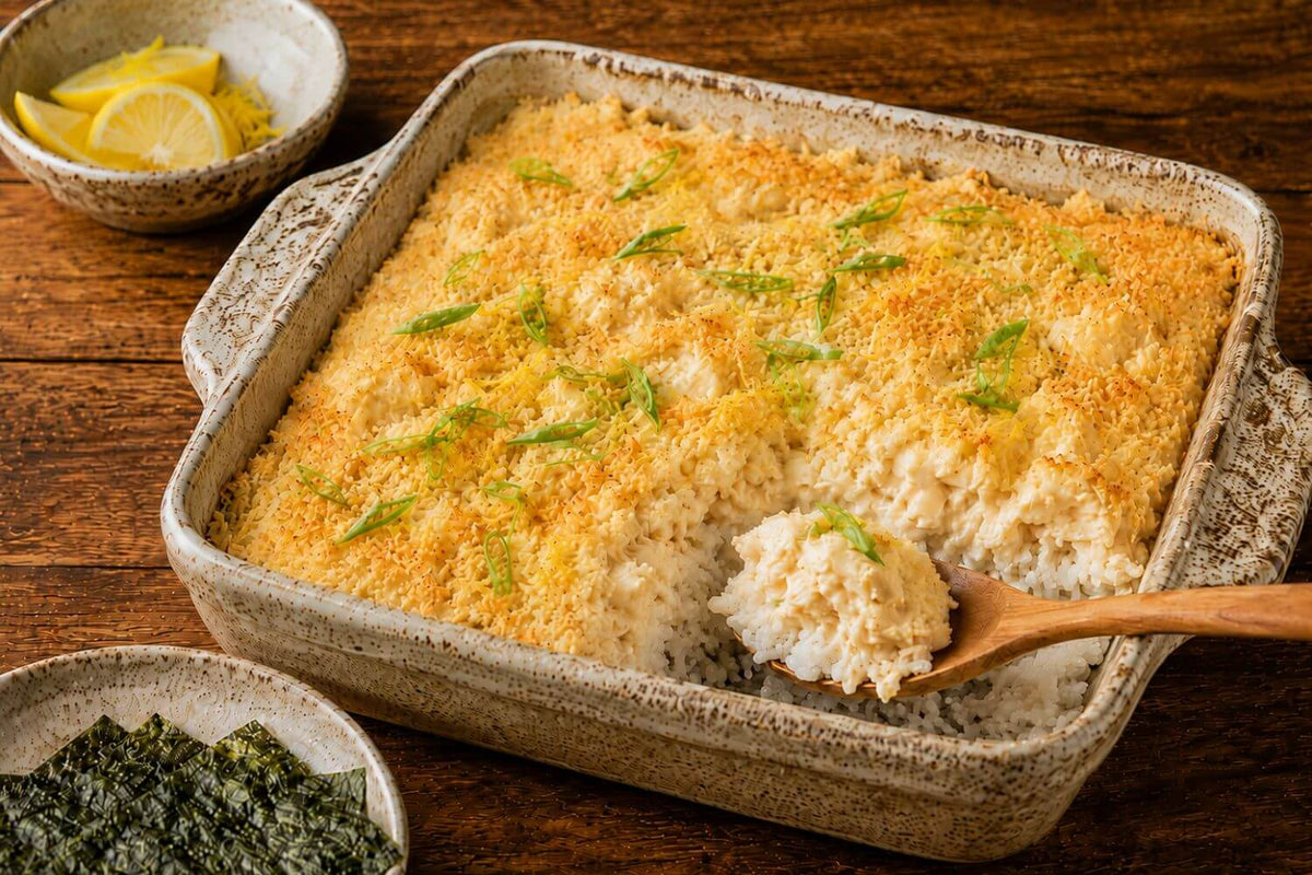 Glacier Bake with halibut and lemon-herb crust in a rustic baking dish, topped with golden panko and served with nori sheets.