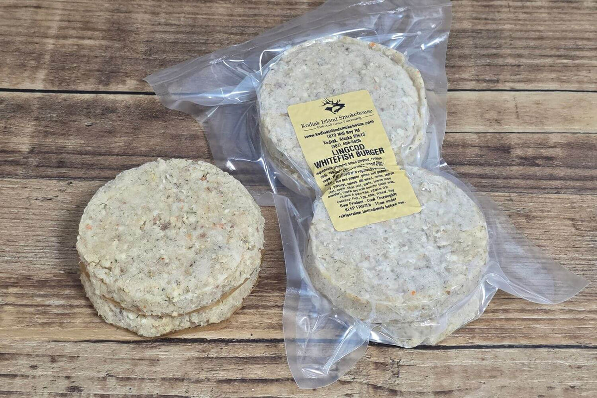 Wild Alaska lingcod whitefish burger patties shown frozen and vacuum-sealed in a 1 lb package.