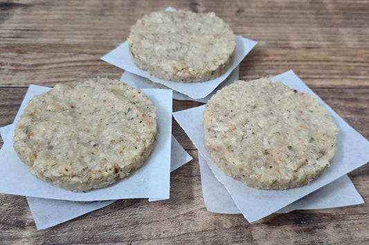 Wild Alaska whitefish cakes made with lingcod, rockfish, and cod, shown as small frozen seafood patties.
